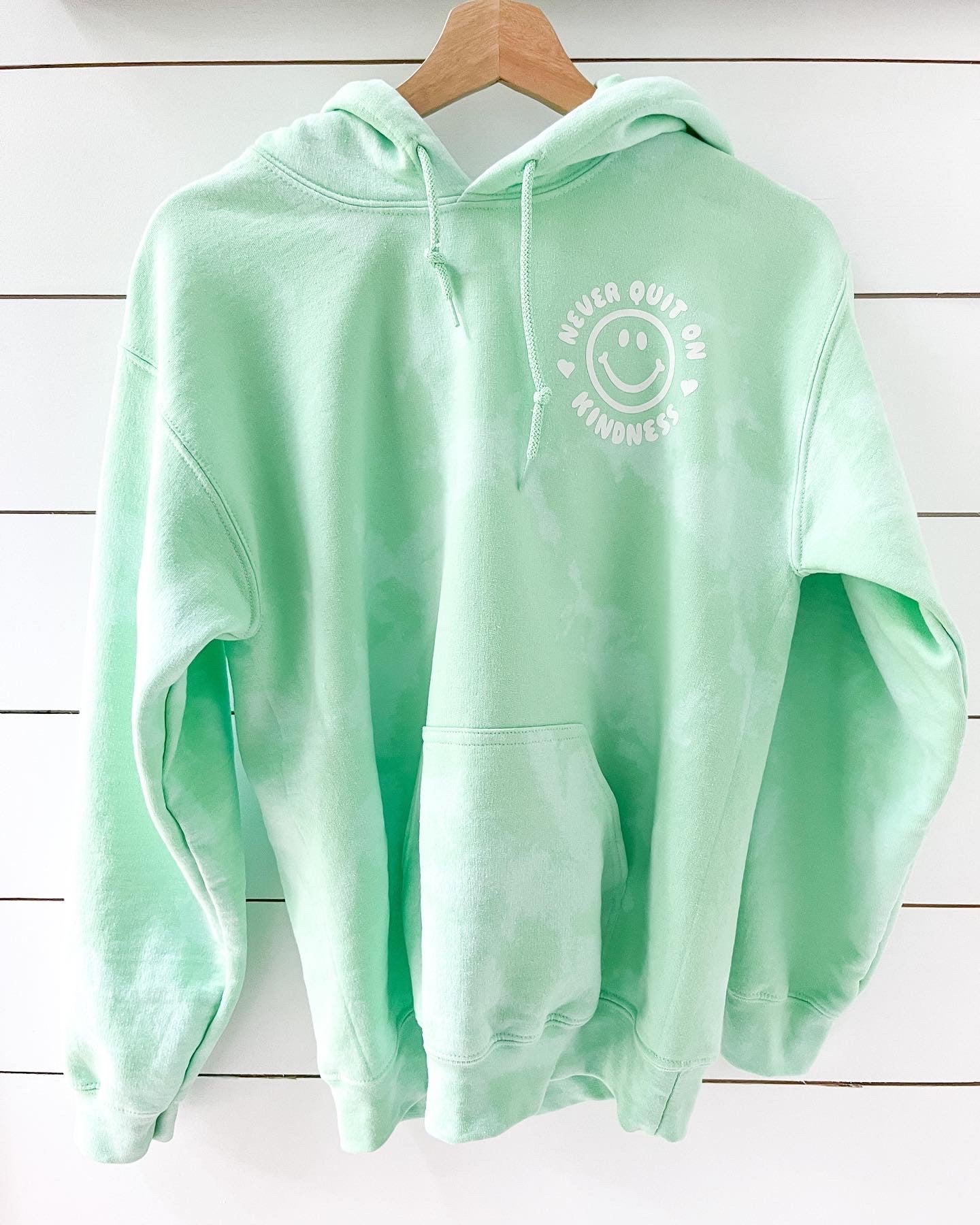 "Never Quit on Kindness" Hoodie | Green Dye Effect